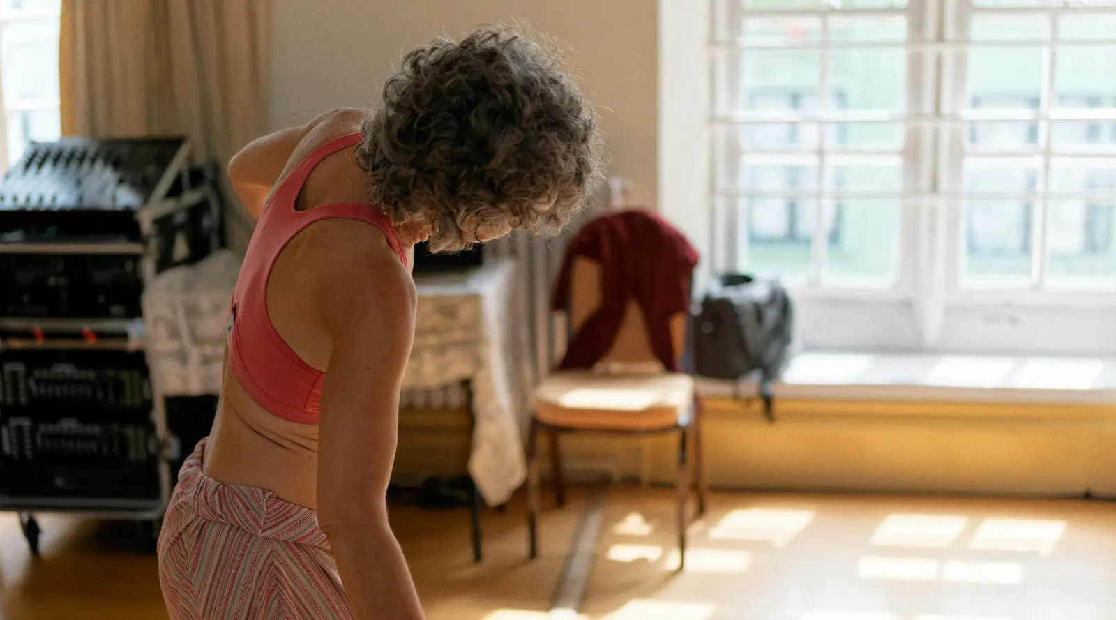 Femme étirement bien-être — coaching individuel sport-santé 45-65 ans